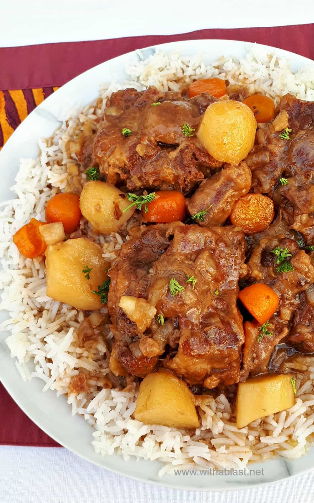 This Oxtail cooked in the Slow-Cooker turns out so tender and fall-off-bone - with a delicious rich sauce