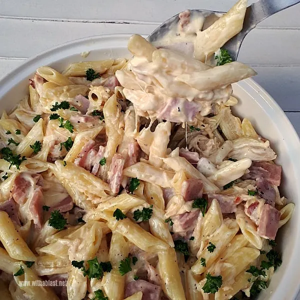 Cheesy Garlic Cream Cheese sauce, Bacon, Chicken and more - this is the ultimate comfort food ! 