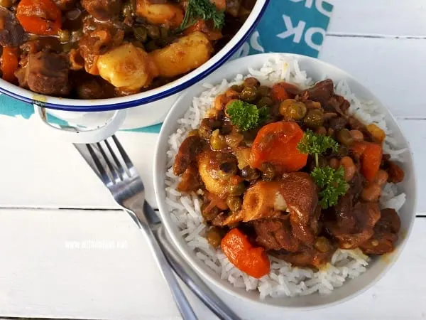 Lamb Curry is rich, tasty comfort food ! Fall-off-the-bone tender and loaded with vegetables - the perfect dinner for cooler evenings and ideal for entertaining too.