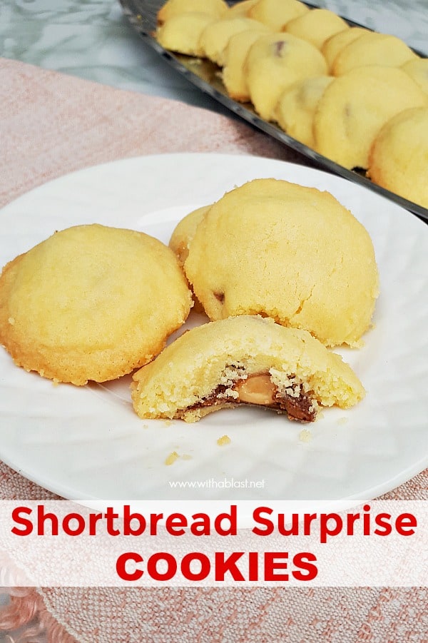 Buttery Shortbread Surprise Cookies have a delicious whole nut chocolate center - pure cookie bliss and you will not be able to stop eating these cookies! #CookieRecipes #Cookies #HolidayBaking #ShortbreadRecipes #EasyShortbreadRecipe