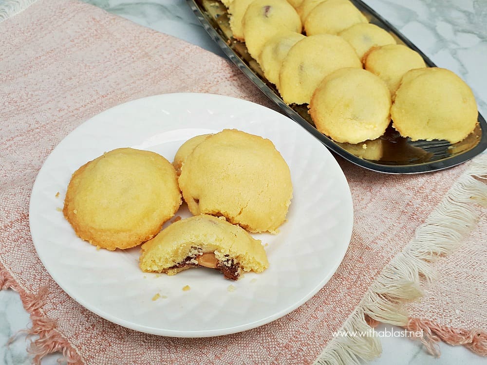 Buttery Shortbread Surprise Cookies have a delicious whole nut chocolate center - pure cookie bliss and you will not be able to stop eating these cookies!