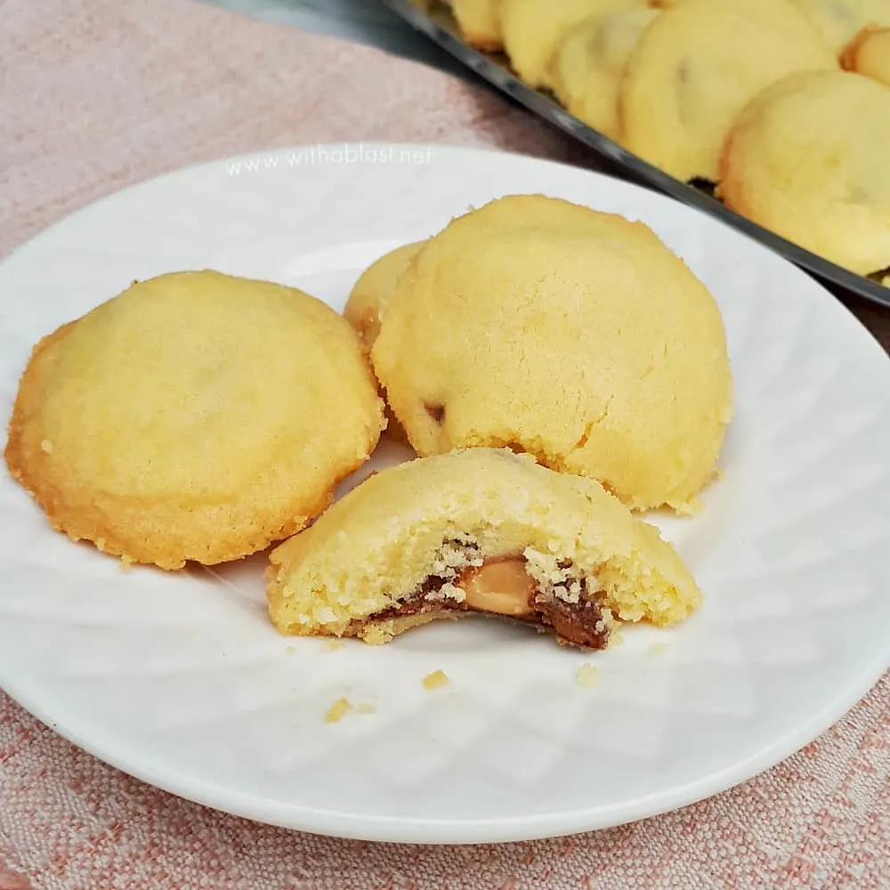 Buttery Shortbread Surprise Cookies have a delicious whole nut chocolate center - pure cookie bliss and you will not be able to stop eating these cookies!