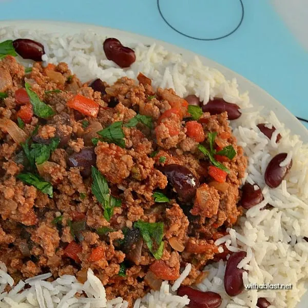 Cuban Picadillo served with a side of Rice and Beans is a quick ground beef, spicy dinner - only 30 minutes from prepping to serving ! 