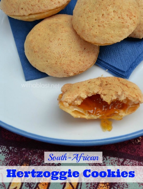 Hertzoggie Cookies are one of the most popular cookies in South-Africa. They are jam/jelly filled cookies with a light coconut, meringue topping.