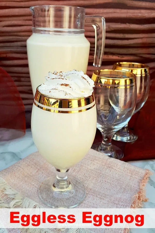 Quick, easy and delicious recipe for thick EggLess Eggnog made with standard pantry ingredients (boozy or not!) and the must have drink for Christmas ! #EgglessEggnogRecipe #NoEggEggnog #EggnogRecipes #ChristmasDrink