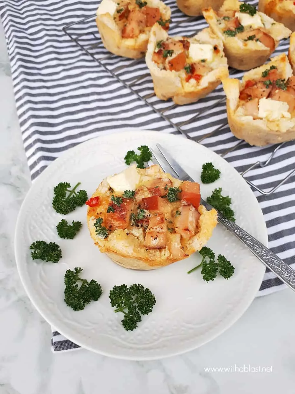 A very versatile recipe for Chicken and Creamy Garlic Bread Baskets - serve as a light dinner, snack or as an appetizer. Perfect to use up leftover Chicken and Bread.
