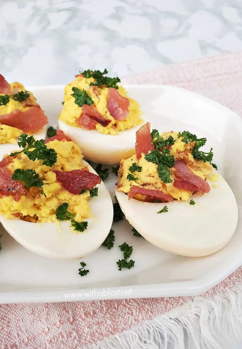 These Honey-Bacon and Cheese Deviled Eggs with a salty-sweet taste are made in a flash and a must have snack for savory platters - parties, Game day etc