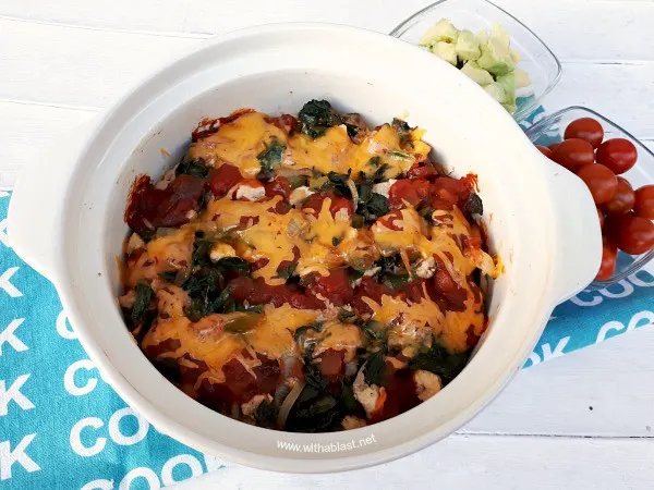 Layers of cheesy, comfort food ! The spinach makes this Chicken Taco Casserole and even non-spinach eaters loves it
