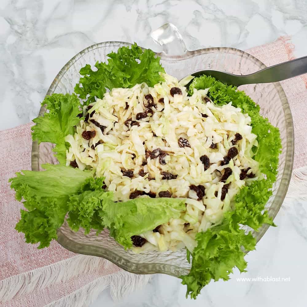 Simple, yet delicious, Cabbage and Onion Salad with raisins is the ideal addition to most main meals and especially good served with barbecued meat