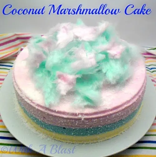 Coconut Marshmallow Cake perfect for Easter - crowd pleaser ! www.withablast.net Coconut Marshmallow Cake