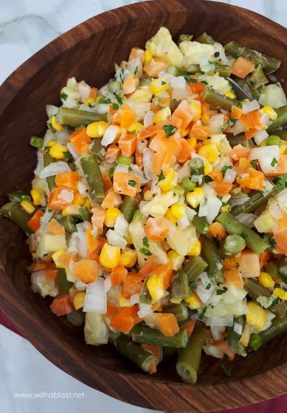 Tropical Vegetable Salad is loaded with vegetables and the added Pineapple makes the salad a hit, especially with kids - savory-sweet crunchy delicious!