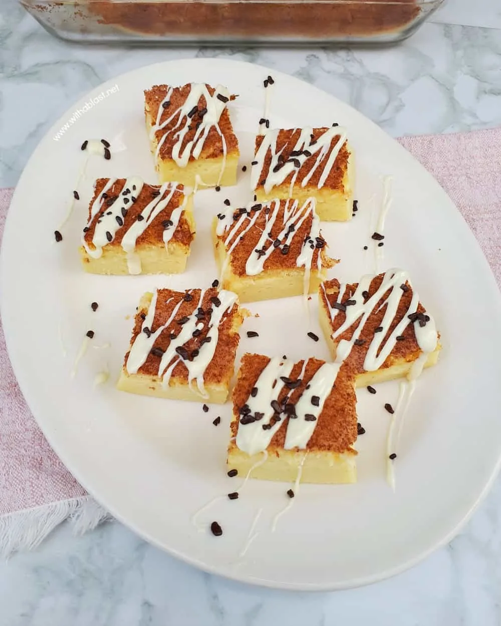 Chocolate Drizzled Milk Tart Squares are my spin of the popular South-African Milk Tart and a perfect addition to a sweet party platter