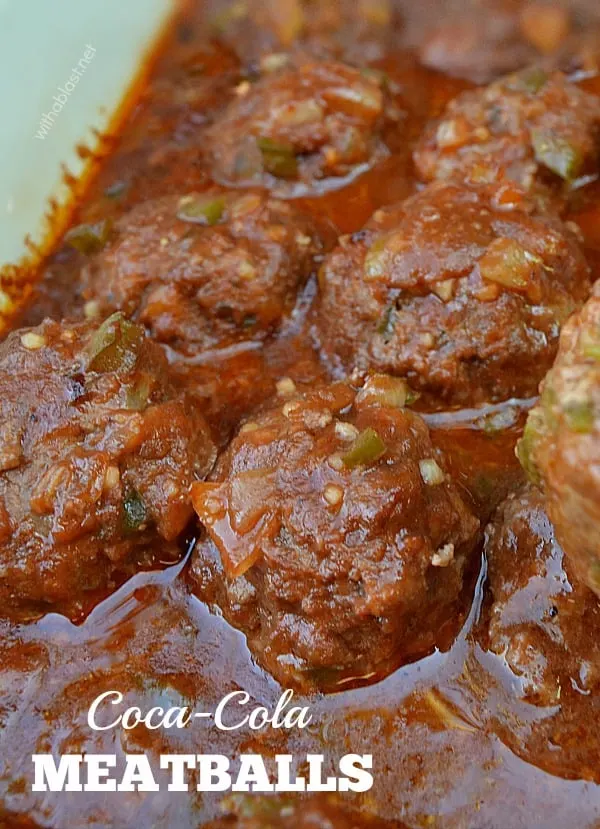 Comforting, rich, tangy and saucy Coca-Cola Meatballs - my family's favorite dinner choice ! Serve over pasta, rice or mashed potatoes