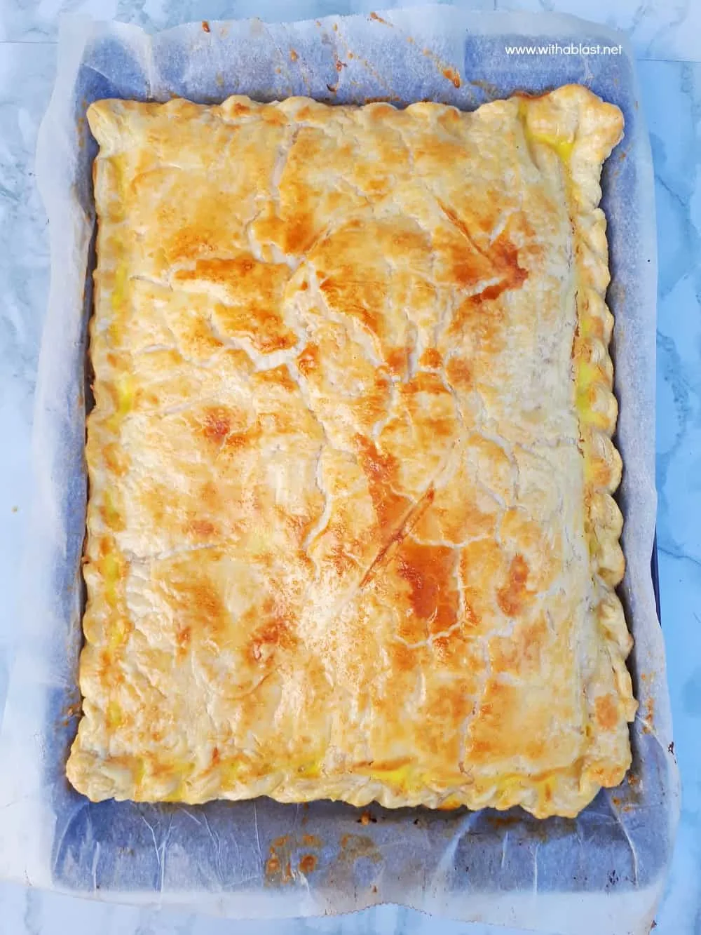 Ham and Cheese Pie is so quick and easy to make using a sheet pan and you can easily fit two pans into your oven - serve as a snack, breakfast or light dinner