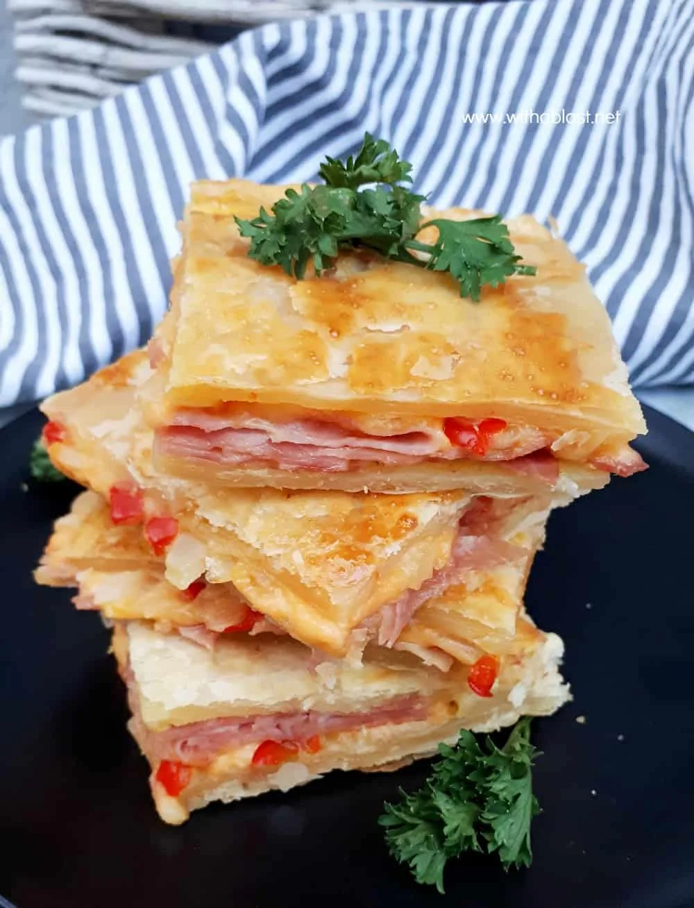 Ham and Cheese Pie is so quick and easy to make using a sheet pan and you can easily fit two pans into your oven - serve as a snack, breakfast or light dinner