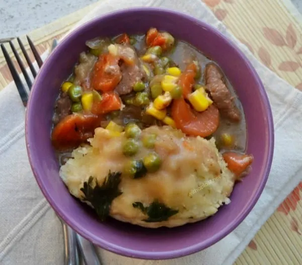 Comfort food at it's best - hearty Beef stew with a thick sauce and featherlight Dumplings One-Pot Beef and Dumplings Stew