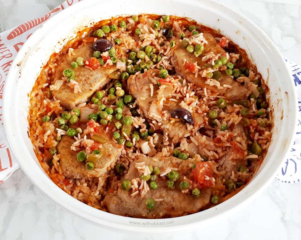 One-Pot Pork Chop and Rice Casserole is an all in one Dinner with tender, juicy Pork Chops, vegetables and tomato rice [easy oven baked recipe]