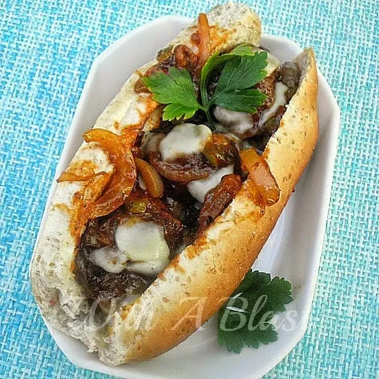 Juicy delicious Italian Meatball Sliders with melted Mozzarella topping ! So good to serve on Game Day or for lunch and great as a light dinner as well