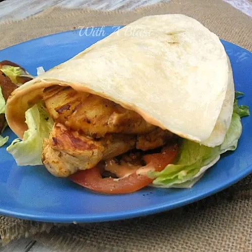 Crazy delicious Mojo marinated Chicken burger in a new fun way ~ in a folded over Tortilla !  Mojo Chicken Tortilla Burger