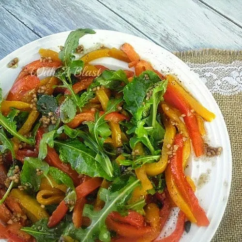 Roasted Peppers Salad is a tenderly roasted Bell Peppers with Herb Leaves Salad which goes with any main meal and kids actually love this !