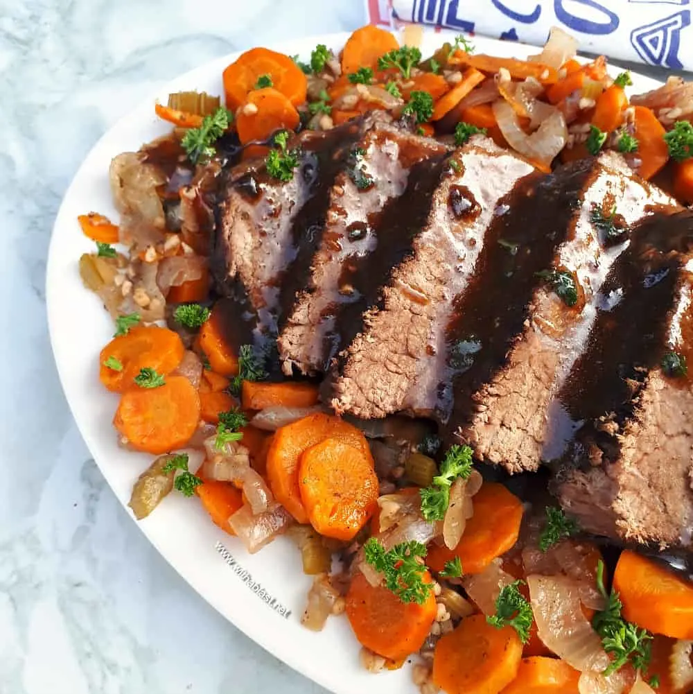 Best Slow-Cooker Pot Roast turns out so tender and juicy with vegetables all cooked in the slow-cooker - no fuss recipe and ideal for a Sunday roast !
