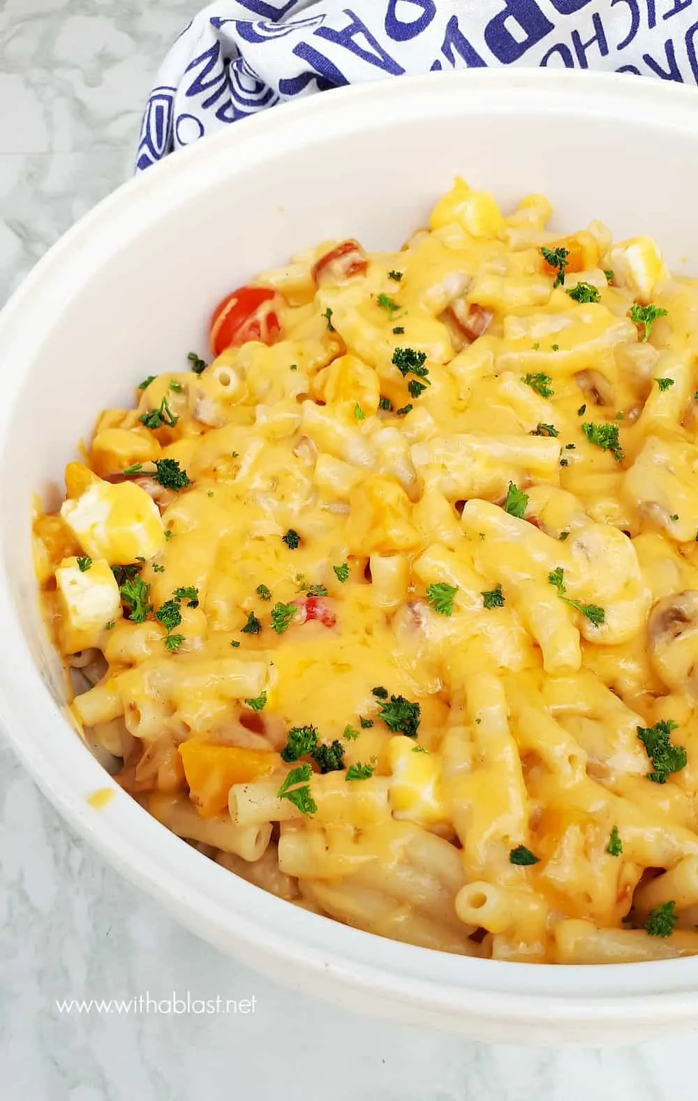 This Mothership Macaroni and Cheese IS worthy of the name ! Loaded with vegetables, two cheeses and perfect for feeding a crowd #MacAndCheese #MacaroniAndCheese #PastaDinner