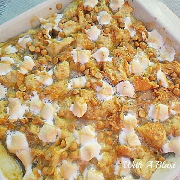 Simply the BEST and EASIEST bread pudding, filled with gooey, saucy deliciousness and topped with S'mores and Chocolate Chips