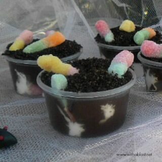These Hatching Worms Pudding Bowls for Halloween are not only perfectly gory-looking, but a delicious sweet treat too - quick and so easy to make