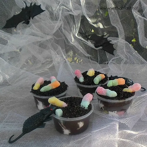 Hatching Worms Pudding Bowls ~ Worms hatching from the Eggs on the bottom, slivering their way up to the top will make a quick, inexpensive treat to your Halloween table ! #Halloween #HalloweenTreats www.WithABlast.net