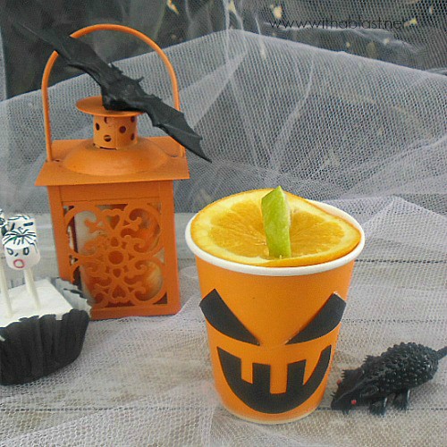 Jack-O-Lantern Slimy Slush is a fun Halloween drink - non-alcoholic, quick recipe and easy to make the "Lanterns", using all standard pantry ingredients.