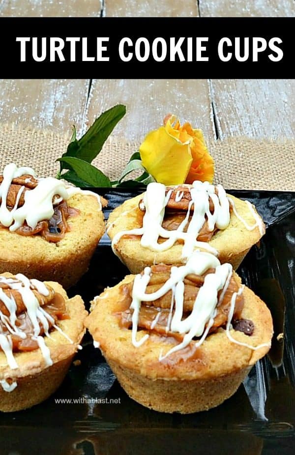 Quick, easy and delicious Cookie Cups filled with Chocolate Chips, chopped Pecans, Caramel and topped with another Pecan Nut and drizzled with White Chocolate 