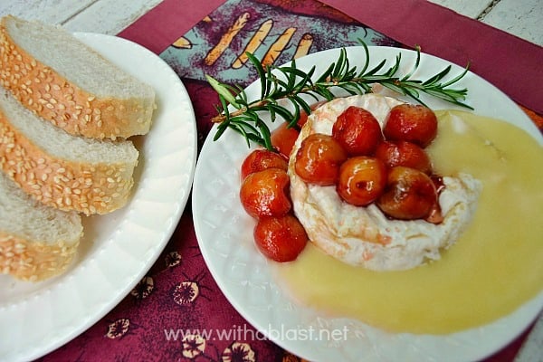 Baked Camembert with Honey Roasted Cherries ~ The ultimate in Appetizers ! Soft, gooey cheese topped with caramelized Honey roasted Cherries