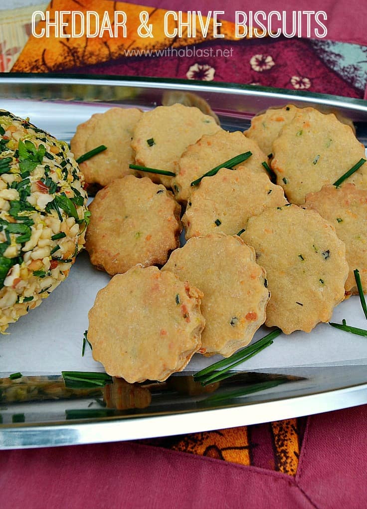 The fresh taste of Chives and rich Cheddar make these savory biscuits {crackers} 100% better than any store-bought kind and is perfect to serve with dips and cheese balls as an appetizer {Quick and Easy recipe} #SavorySnacks