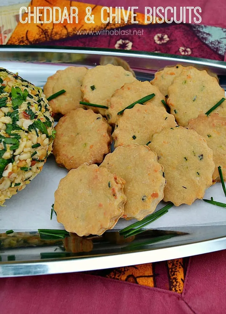 The fresh taste of Chives and rich Cheddar make these savory biscuits {crackers} 100% better than any store-bought kind and is perfect to serve with dips and cheese balls as an appetizer {Quick and Easy recipe} #SavorySnacks