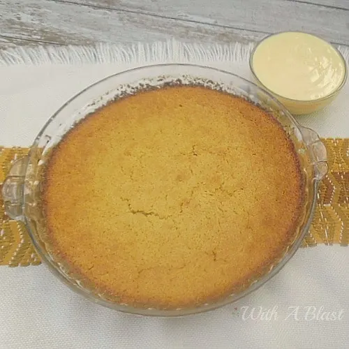 Coconut Caramel Pudding Pie is an easy mix and bake recipe. Gooey, sweet, coconut and caramel rich pudding, best served with custard, cream or ice-cream