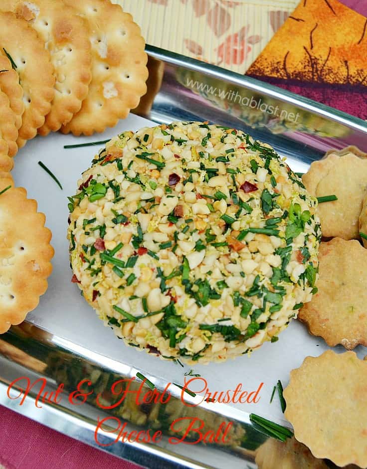 Tasty Cheese Ball with the most delicious, somewhat spicy, Nut and Fresh Herbs Crusted all around - this is a winner as an Appetizer every time and great to add to a savory platter too ! #Appetizer #Snack