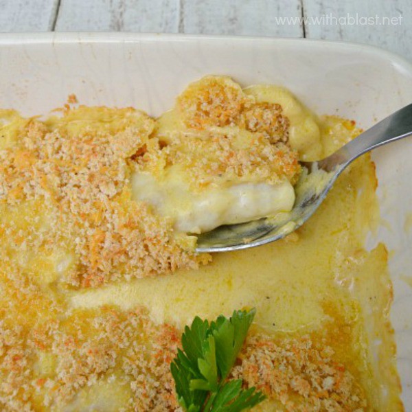 Smothered Fish which is also known as Fish Mornay is a popular dish - fish covered in a thick, tasty cheese sauce and a crunchy topping #SmotheredFish #CheesyFish #FishMornay #MornaySauce