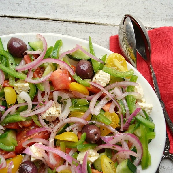 Greek Salad with Marinated Onions ~ The ever popular Greek Salad gets a small makeover and it is scrumptious ! Definitely a salad recipe you need to add to your collection, especially when you have a BBQ !