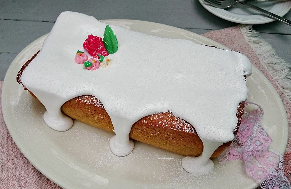 Divine Coconut Cake is a moist, dense cake loaf with the most amazing thick Frosting - perfect for any occasion, dessert or a tea time treat