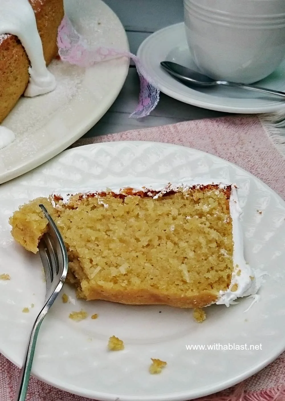 Divine Coconut Cake is a moist, dense cake loaf with the most amazing thick Frosting - perfect for any occasion, dessert or a tea time treat