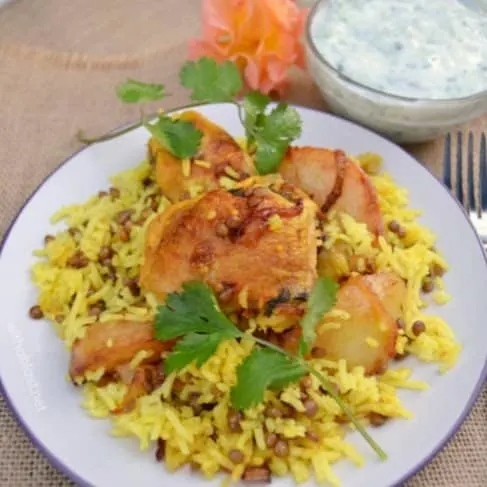 Chicken Breyani with Raita is a spicy, comforting meal to serve on a cool evening - filled with the best spices and all pantry ingredients