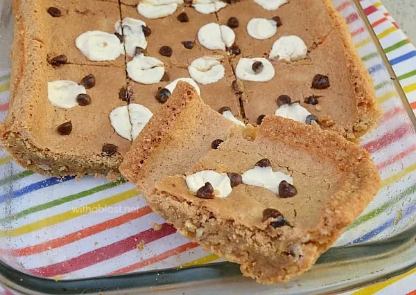 Chewy Blondie Cookie Bars have a gooey center and a crunchy top and edges - double delight and ideal to serve at tea time or for dessert. Chewy Blondie Cookie Bars have a gooey center and a crunchy top and edges - double delight and ideal to serve at tea time or for dessert.