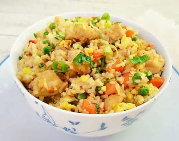Chicken Fried Rice is perfect for a week night dinner. And if you already have leftover Rice on hand, this dish will be done and on the table in minutes