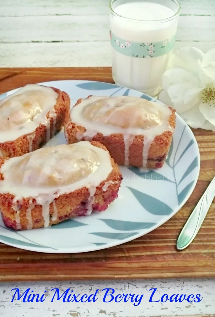 Feather light, moist Mini Mixed Berry Loaves are made with Orange Juice instead of milk and perfect to serve at breakfast, lunch or as an anytime sweet treat #BerryLoaves #SweetTreats #Brunch