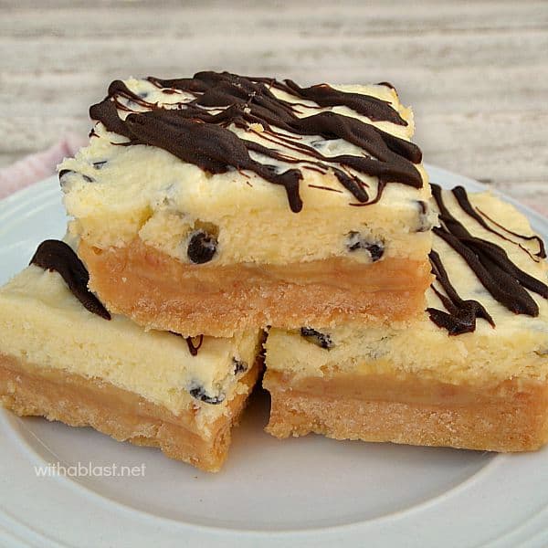 Layers of delight in these Millionaires DESSERT Bars - Shortbread, gooey Caramel and smooth, creamy White Chocolate Mousse {a restaurant copycat recipe!}