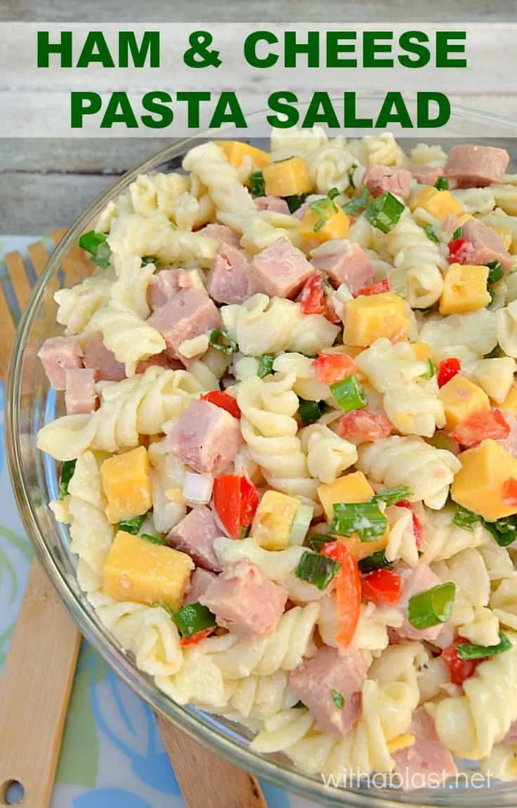 A simple, yet popular, delicious Ham and Cheese Pasta Salad with just enough dressing to make it tasty enough for seconds (or thirds ! )