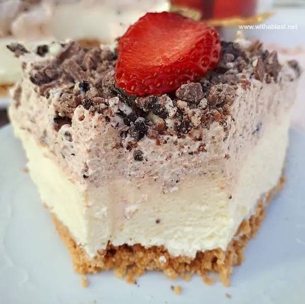 This No-Bake Cheesecake had my family raving ! Crust, Cheesecake layer, Chocolate Mousse and more Chocolate !