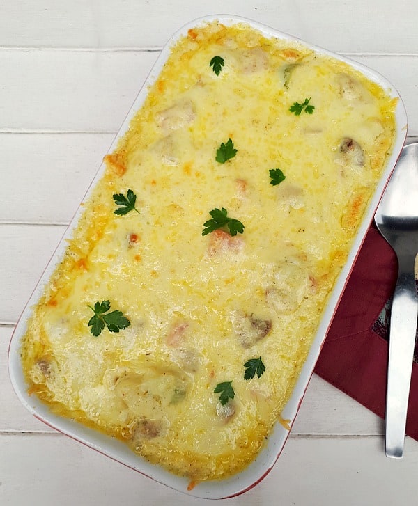 Creamy, cheesy and the perfect comfort dinner, or can be served without the Ham as a side dish (Meat and Vegetable substitutions given as well)