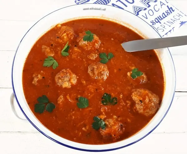 Rich Tomato based Soup with Mozzarella stuffed Meatballs make a hearty, warming dinner