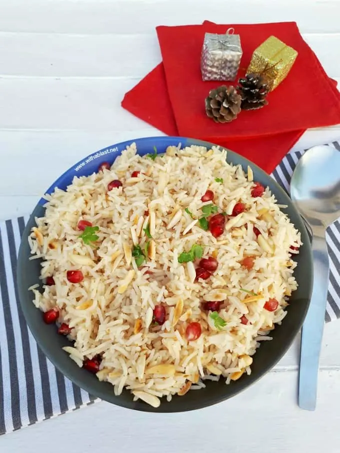 A Quick and easy recipe for Pomegranate Almond Rice - perfect to serve as a side to any main Festive meal, which might just steal the show !